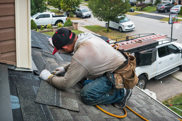 Professional Roofing technician working in Farmington, NY
